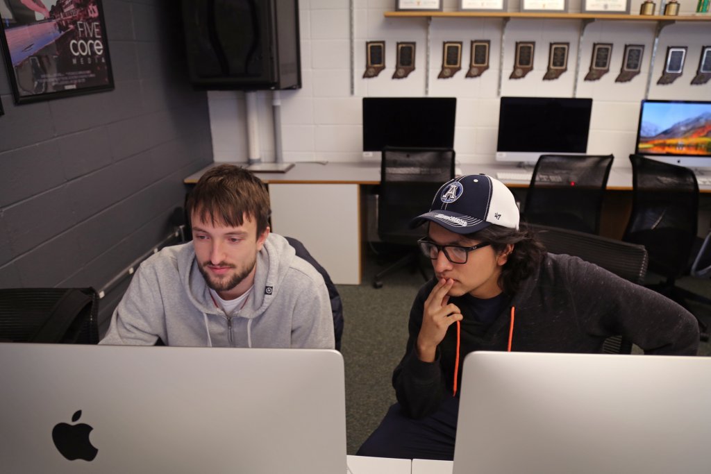 Two students working on the computers