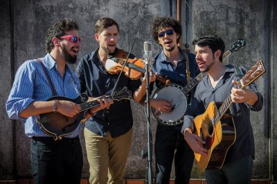 Four men playing instruments