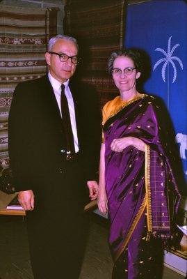 A man and a woman standing next to each other