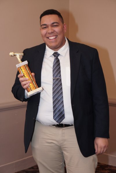 Man holding an award