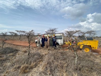 Student researchers prepare for a prescribed burn in the Kenya Long term Exclosure Experiment (KLEE).