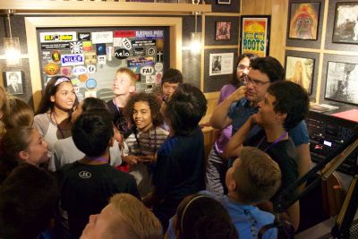 Goshen Write on Sports campers squeeze into a studio at 91.1 the Globe.